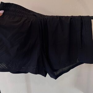 62. Athleta Black Laser-Cut Hem Athletic Shorts